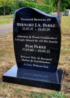 Back and gold headstone by Prince stone masons