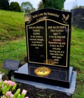 black and gold headstone by prince stone masons